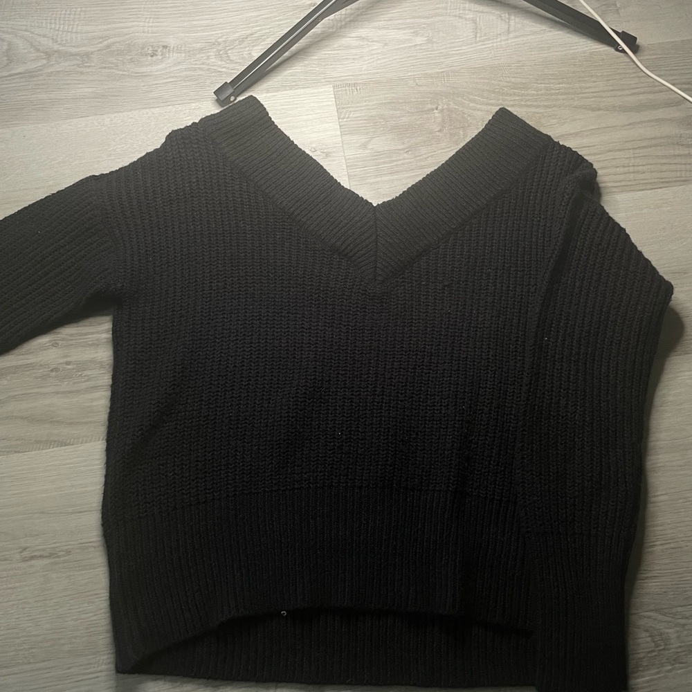 Black sweater knit off the shoulder
